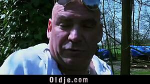 older guy seduces horny teen in garden for handjob.