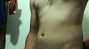 skinny young guy says, 'watch me undress and stroke my big cock in the bathroom'