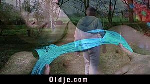 older guy seduces horny teen in garden for handjob.