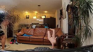 Naked model poses during intimate photoshoot.