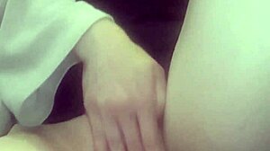 Horny amateur with big tits massages wet pussy in homemade solo