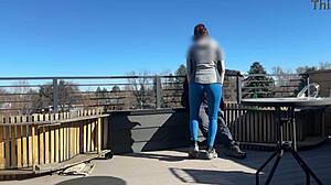 Wow, redhead slut blows big cock on roof!