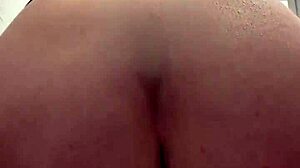 I feel my pussy stretching wide around this massive dildo pushing deeper inside