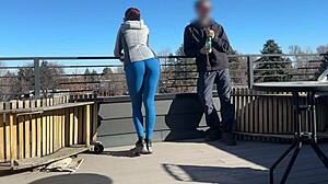 Wow, redhead slut blows big cock on roof!