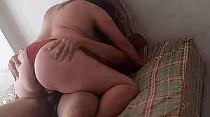 Four guys are taking turns eating out the married woman's ass and tits