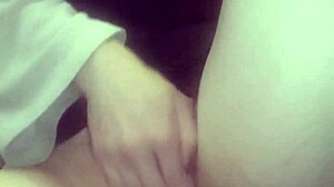 Horny amateur with big tits massages wet pussy in homemade solo