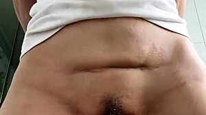 What Happens When Curly Brunette Babe Oils Up for Wet T-Shirt Play and Flashes Big Clit Pussy Lips