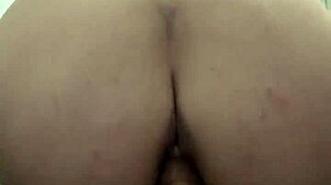 I feel my pussy stretching wide around this massive dildo pushing deeper inside