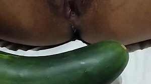 skinny girl flashes and masturbates with big cucumber