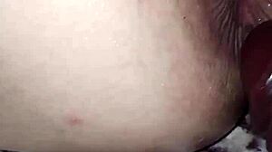 Cuckold stretches ass while she cums wildly.