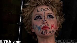 how does the femdom tame her leather pet in this bondage contest?