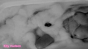 I play with my toy in the bath