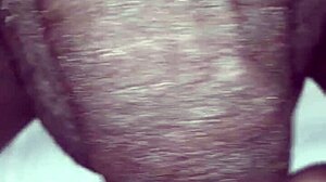 Man plays with huge black monster cock close up