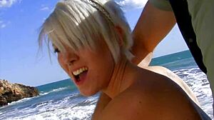 Blonde tattooed mom narrates her story of riding cock passionately on the beach