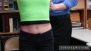 what's this teen girl doing with blonde amateur on desk while lp officer watches her