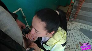 girl next door gives risky blowjob on public staircase for swallow