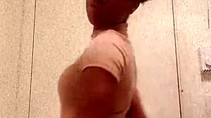 black girl shows her ass in the bathroom casually