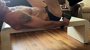 Preview Of Aggressive Myofascial Pressure And Release Stretching On Table In Underwear With Percussion Massager