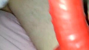 Wearing a latex suit with sheath for the costume event with husband