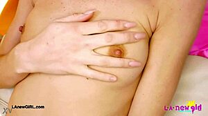 Skinny teen 18+ blonde shows sexy body on sofa.