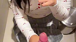 In public restroom, 18-year-old asian girl gives blowjob ending in huge cumshot