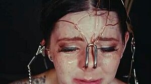 emo bondage whore gets face tied and punished with piss in garage