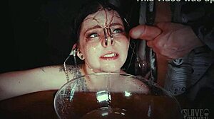 emo bondage whore gets face tied and punished with piss in garage