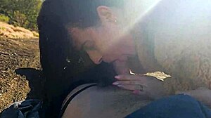 Tourist Guide Shows Something to Tourist on Mountain