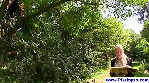 doggystyle banged beauty in stockings gets pissed on in a group threesome.