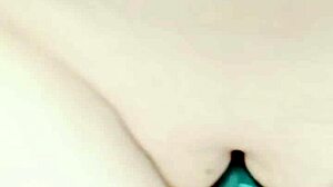 Mature cougar's big pussy lips slide and grind, wet and hairless.