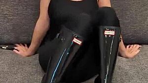 Detailed Look at Black Bodysuit Paired with Black Hunter Boots