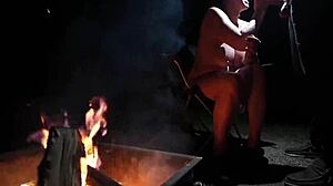 Naked beauty in the forest indulges in outdoor pleasure