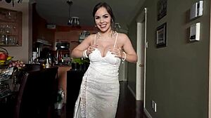 Married bride dances seductively in wedding dress