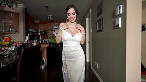 Married bride dances seductively in wedding dress
