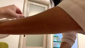 hot nurse in latex gloves arranges therapy session