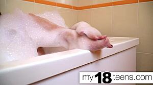 Does cute babe masturbate in the bath? Orgasm closeup.