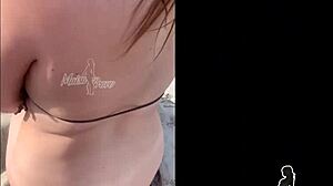 Redhead wife gives blowjob and doggystyle on beach