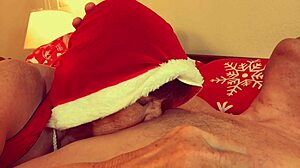 Granny Carmen Claus deepthroats in Christmas cosplay.