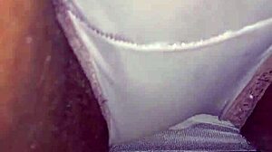 Ebony woman rubs her wet creamy pussy