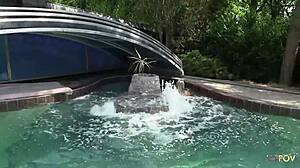 playful lesbian teens play at the pool
