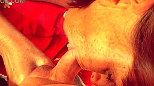 Granny Carmen Claus deepthroats in Christmas cosplay.