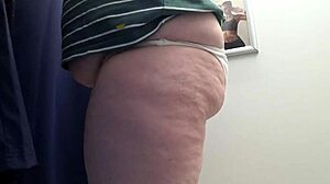 big ass in white panties tries tight leggings in fitting room