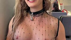 Woman flashes pierced nipples on train in sheer top