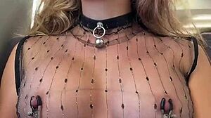 Woman flashes pierced nipples on train in sheer top