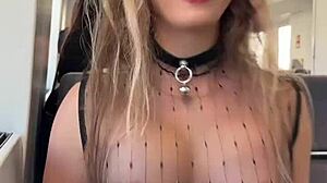 Woman flashes pierced nipples on train in sheer top