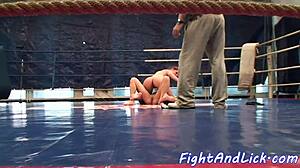 European women wrestle on the floor