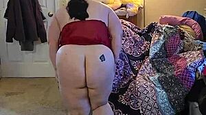 BBW babe strips out of her lingerie teasingly