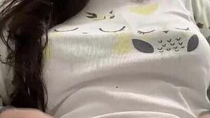 Individual applies hair clamp during personal activity