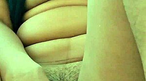 beautiful latina girl explores her tight pussy with a cucumber for the first time in her bedroom.