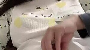 Individual applies hair clamp during personal activity